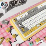 Whimsical Dog Theme PBT MDA keycap set from various angles, featuring adorable dog illustrations and paw prints on durable, warm-colored keys.
