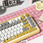 Close-up of the whimsical dog theme PBT MDA keycap set from multiple angles, showcasing durable PBT material, adorable dog illustrations, and playful design.