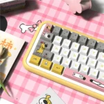 Playful Dog Theme PBT Keycaps set, Cherry profile, showcasing heartwarming dog illustrations and paw prints from various angles on vibrant PBT material.