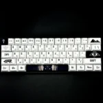 Close-up of Egypt Keycaps Set, showcasing durable PBT with intricate ancient Egyptian hieroglyphs and pharaoh designs in golden desert tones.