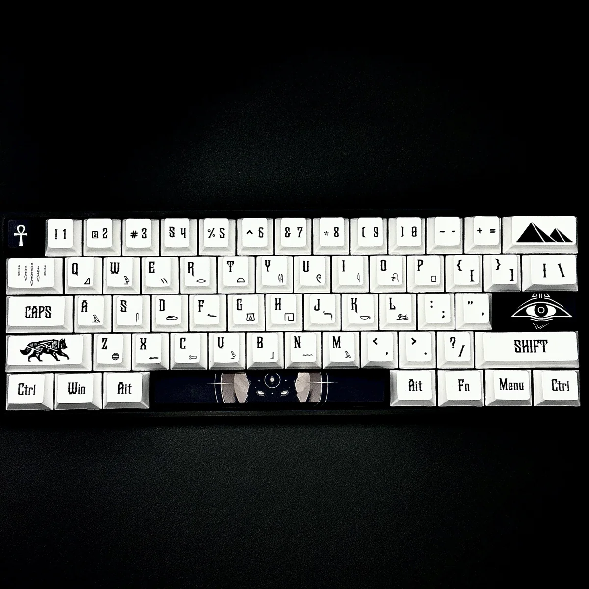 Close-up of Egypt Keycaps Set, showcasing durable PBT with intricate ancient Egyptian hieroglyphs and pharaoh designs in golden desert tones.