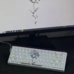 Elegant rose side-engraved PBT magnetic keycap set. Features include magnetic switch compatibility, subtle rose design, and crisp backlighting.