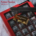 Fortune Freedom Enter Key Keycap, an opulent Enter keycap, gleaming from a distinct angle. Its metallic design embodies wealth and financial freedom.