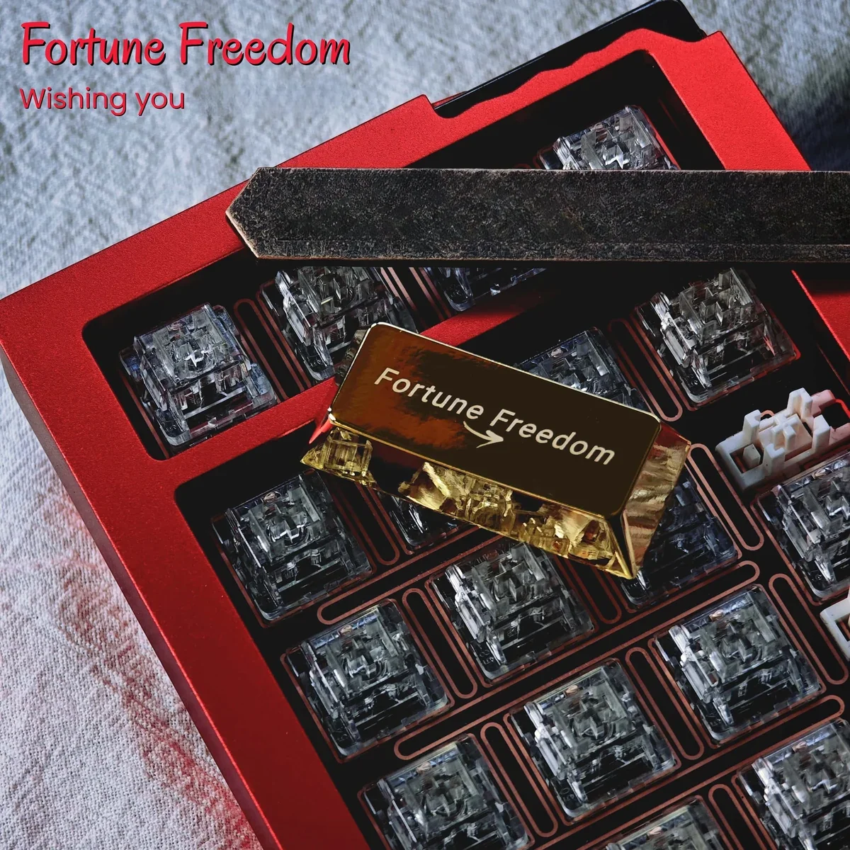 Fortune Freedom Enter Key Keycap, an opulent Enter keycap, gleaming from a distinct angle. Its metallic design embodies wealth and financial freedom.