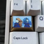 Close-up of a premium titanium Evangelion keycap featuring Asuka and Rei, highlighting the intricate art and durable high-tech aesthetic.