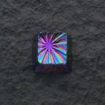 Close-up of the Explosion Series Keycap, showcasing its dynamic sculpted zinc alloy design and vibrant electroplated finish from a unique angles.