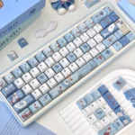 Fallen Alice in Wonderland 134-key Cherry profile keycaps set, featuring a dark fantasy aesthetic with melancholic, whimsical, and mysterious artistic details.