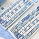 Unique Fallen Alice in Wonderland keycaps set showcasing a dark fantasy, melancholic aesthetic with mysterious, whimsical details.