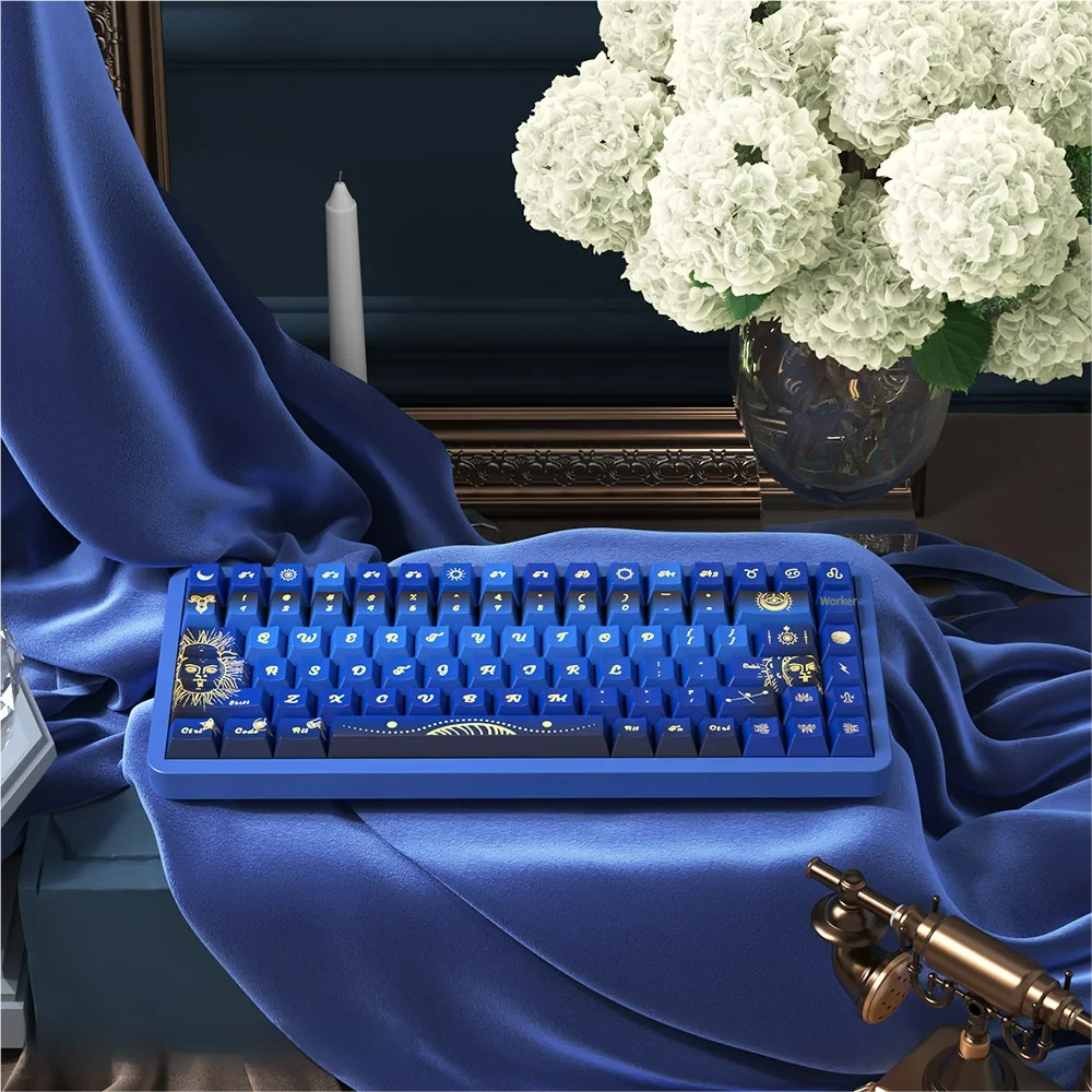 Mystical Fate PBT keycaps set featuring cosmic symbols and astrological motifs in deep colors. Durable dye-sub legends for an artistic keyboard.