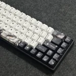 Flowing Shadow Cherry Keycap Set, showcasing subtle side legends, ethereal gradients, and dynamic backlit brilliance from multiple angles.