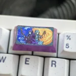 Detailed view of the Frieren & Fern Titanium Artisan keycap (1.75U), highlighting the elegant anime artistry meticulously etched on its sleek, durable titanium alloy.