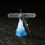 Artisan Frostmourne keycap, angled to reveal its detailed removable icy blue sword and intricate rune base, showcasing interactive premium craftsmanship.