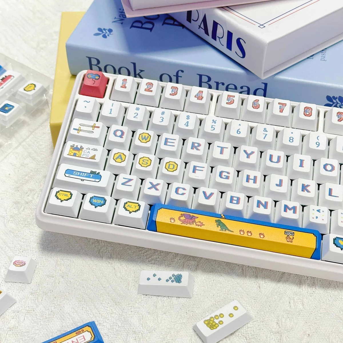 Vibrant collection of Retro Pixel PBT Dye-Sublimation Gaming Keycaps Set, displaying durable PBT with playful pixel art and classic arcade motifs.