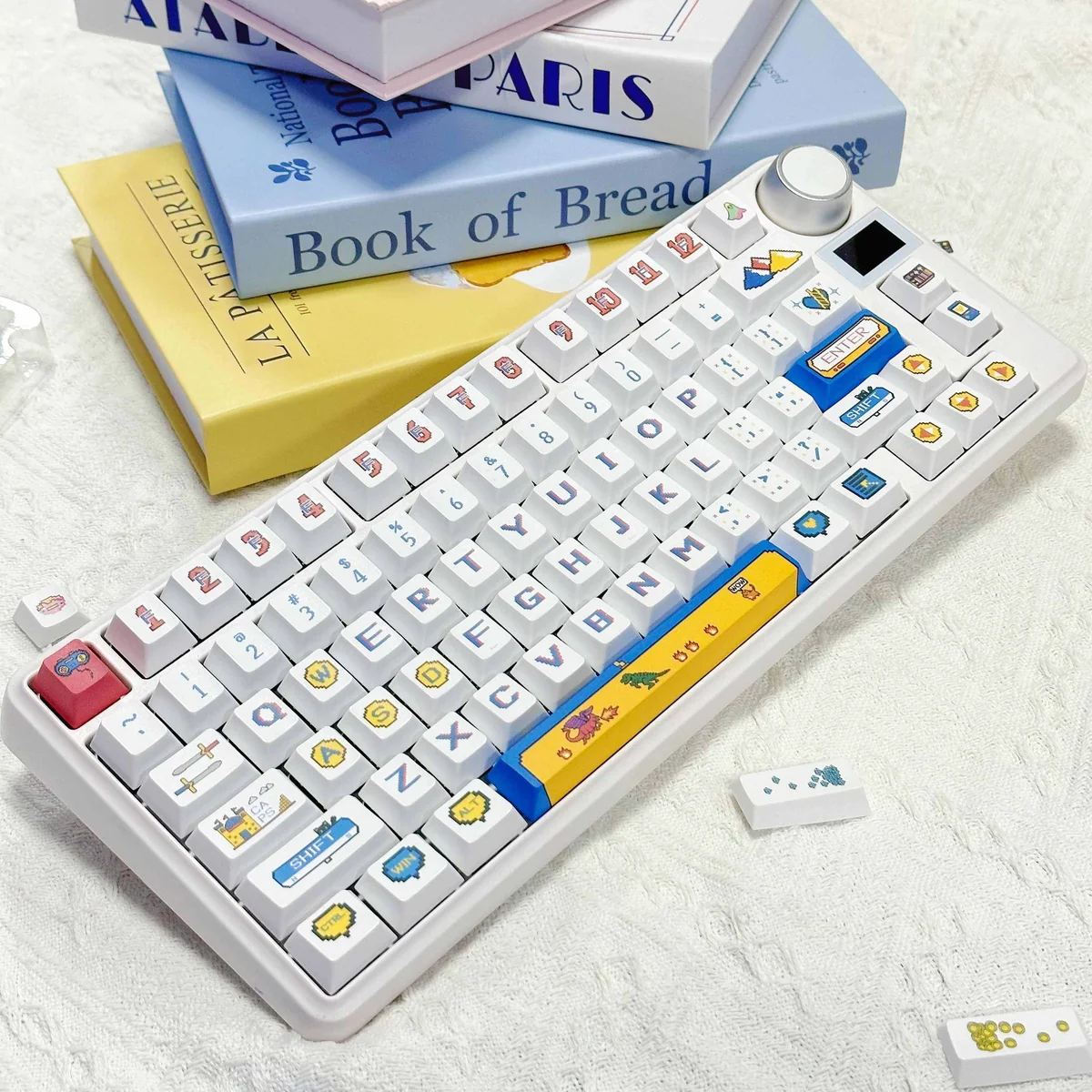 Vibrant Retro Pixel PBT Dye-Sublimation Gaming Keycaps Set showcasing classic arcade art. Durable and colorful for an immersive gaming experience.