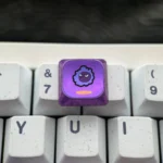 Mischievous Gengar Titanium Keycap, intricately sculpted, premium low-profile design from an artistic side angle. Highlights detailed craftsmanship.