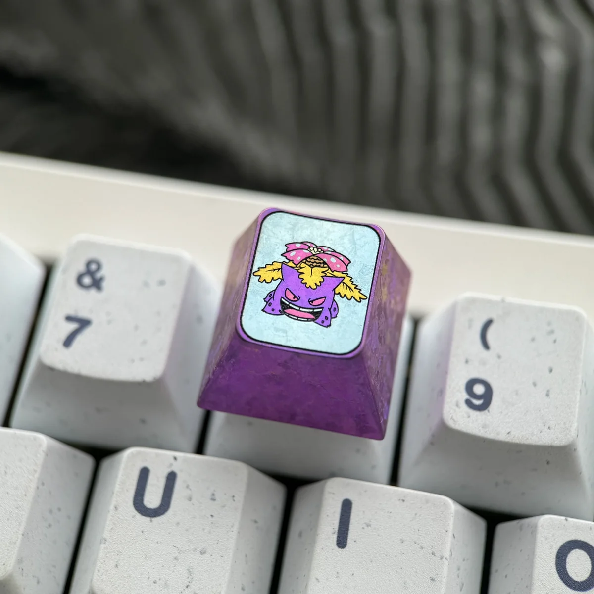 Premium Gengar Titanium Artisan ESC Keycap, an iconic keyboard art piece. Detailed views highlight its durable titanium craftsmanship and dark whimsy design.