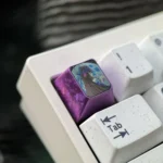 A premium Genshin Impact Columbina Titanium ESC keycap, intricately detailed and exclusive, showcasing its mysterious dark design and ethereal beauty.