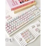 Dreamy Girl's Worries Series Keycap Set for custom keyboards, showcasing its pastel hues and whimsical design from multiple angles, perfect for personalize design.