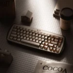 Angled view of the Good Night Cocoa PBT+PC backlit keycap set, showcasing its warm, translucent cocoa hues and premium finish, perfect for serene evening design.