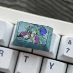 Detailed shot of the premium Hatsune Miku 1.5U Tab titanium artisan keycap, showcasing its iconic design and sleek, durable metallic finish.