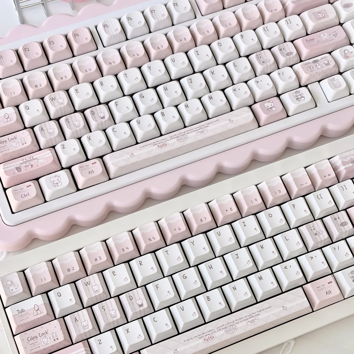 Charming Hello Kitty keycaps in a vibrant fashion blog set, shown from different angles, highlighting the complete, iconic collection.