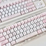 Vibrant Hello Kitty Keycaps Set displayed from multiple playful angles, highlighting charming fashion blog designs and the complete iconic design.