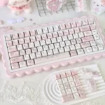 Vibrant Hello Kitty keycaps set, a complete fashion blog set displayed from various angles. Iconic and playful, enhancing any custom keyboard.
