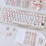 Playful Hello Kitty keycaps set for mechanical keyboards, featuring vibrant fashion blog-inspired keys, showcasing the iconic character.