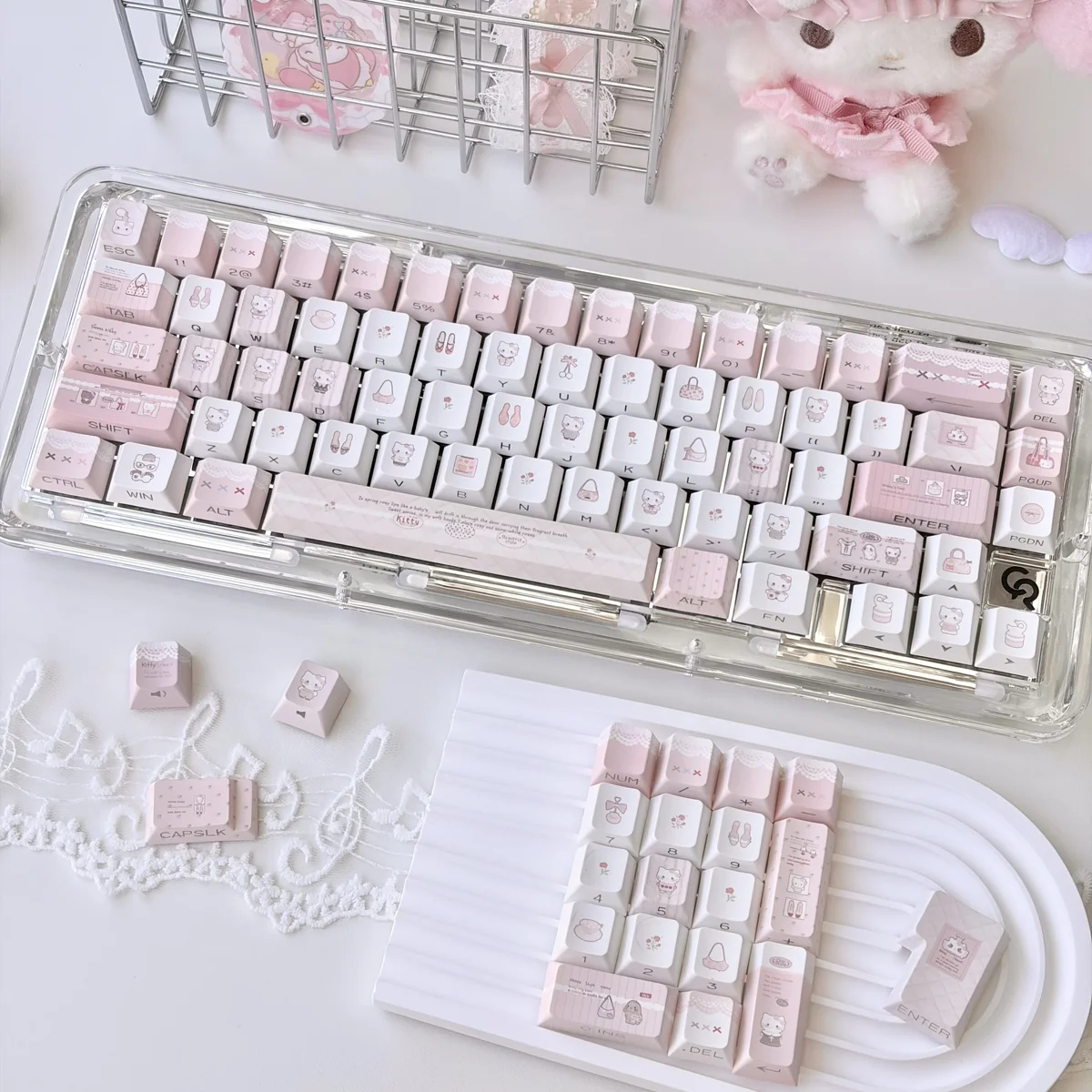 Playful Hello Kitty keycaps set for mechanical keyboards, featuring vibrant fashion blog-inspired keys, showcasing the iconic character.