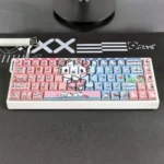 Close-up of Hello Kitty Keycaps Set showcasing the vibrant translucent PBT material and playful side-engraved designs from a unique angle.