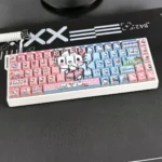 Translucent Hello Kitty PBT keycap set, side-engraved, displays its playful design and vibrant glow. Iconic aesthetics for custom mechanical keyboards.
