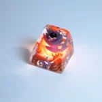 Close-up of a handcrafted translucent Hollow Knight Troupe Master Grimm luminous keycap, showing intricate dark fantasy details and vibrant glow.