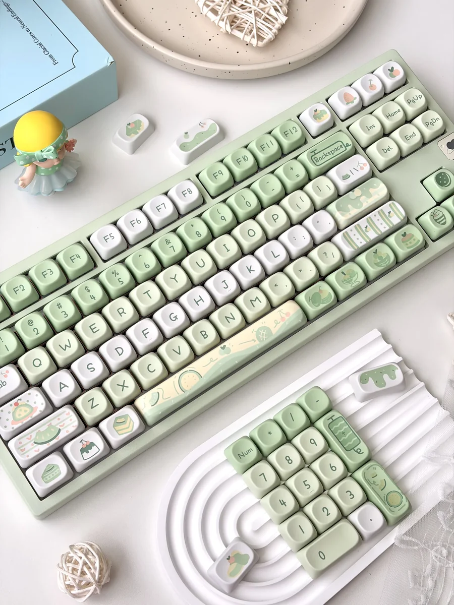 Explore different angles of the Premium Honeydew Ice Cream MOA Keycap Set, featuring its playful pastel colors and creamy dessert aesthetic for delightful setup.
