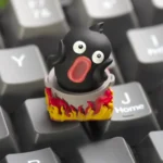 Detailed view of the whimsical Hotpot Duck artisan keycap for ESC key, showcasing its cute duck character immersed in a vibrant, handcrafted resin hotpot.
