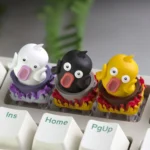 Close-up of a whimsical, handcrafted Hotpot Duck artisan keycap for the ESC key, a unique resin piece with a cute duck in a vibrant hotpot.