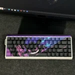 Unleash Gengar's dark charm with this Pokemon: Iconic Gengar Cherry Keycap Set. It glows purple, highlighting its mischievous sculpted details.