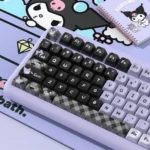 Explore the mischievous Kuromi PBT MDA keycaps set from multiple angles, showcasing its premium quality and iconic black and purple cute-gothic setup.