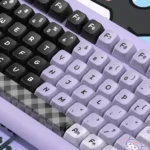 A playful gallery of Kuromi PBT MDA profile keycaps set, showcasing the mischievous black and purple design from various angles, perfect for fans.