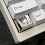 Premium Makima Titanium Keycap for Chainsaw Man fans, showcasing its sleek anodized titanium alloy and intricate anime design from a unique perspective angles.