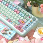 Elegant Ink Wash Brilliance keycaps set displaying traditional Chinese ink painting art and nature motifs from various angles, bringing refinement to any desk.