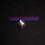 Artisan-crafted Interstellar Alloy keycap. Premium, intricate cosmic designs and celestial bodies captivate from various detailed angles.