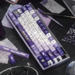 Detailed side view of the handcrafted JX Online 3 Badao Clan artisan keycap set, revealing intricate Wuxia artistry and the fierce mythical creature's scene.