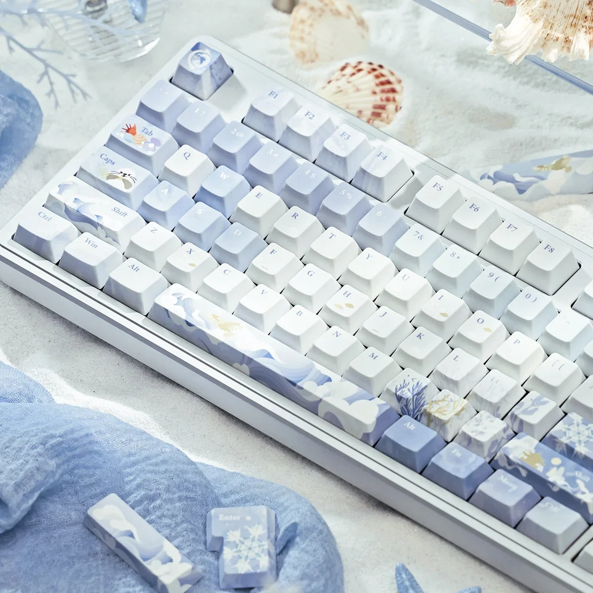 Artistic product views of JX3 Penglai Keycaps Set, revealing their exclusive mystical ocean realm design. Ethereal blue hues and traditional Chinese fantasy.