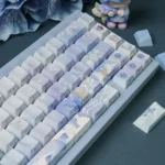 JX3 Penglai Keycaps Set: exclusive mystical ocean realm design. Ethereal blue, Chinese fantasy, flowing Penglai landscapes, various artistic angles.