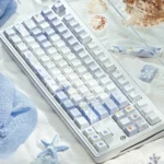 JX3 Penglai Keycaps Set: Exclusive mystical ocean realm design. Ethereal blue traditional Chinese fantasy motifs and flowing details shown from multiple angles.