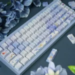 JX3 Penglai Keycaps Set: An exclusive keyboard set featuring a mystical ocean realm design with ethereal blue and traditional Chinese fantasy motifs.
