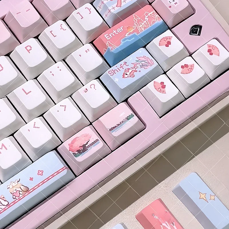 A close-up view of the JX3 Qi Xiu pixel keycaps set, highlighting the exclusive JX Online 3 elegant clan art from multiple artistic angles.