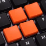 Vibrant PBT Kailh Choc V1 low-shaft keycaps showcased from various angles, emphasizing their clean, minimalist design and perfect fit for Choc switch.