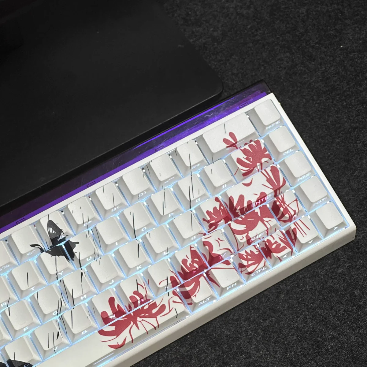 Multiple angles of the Ken Kaneki side-lit PBT keycaps set, showcasing their enigmatic glow and dark anime aesthetic. Close-ups reveal the iconic side-engraved.
