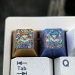 Premium Titanium Evangelion Keycap: Artistic artisan featuring Asuka & Rei amidst a dynamic broken glass design, a lustrous collector's piece.